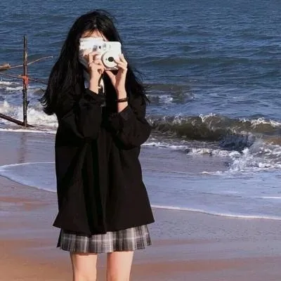nide_xiaogou海边黑色服装站姿自拍